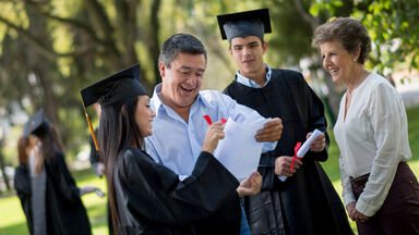 graduates with their degrees