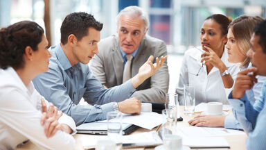 people in corporate meeting