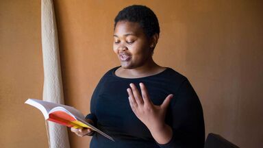 woman reciting easy poem to memorize