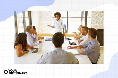 A woman leading team meeting.